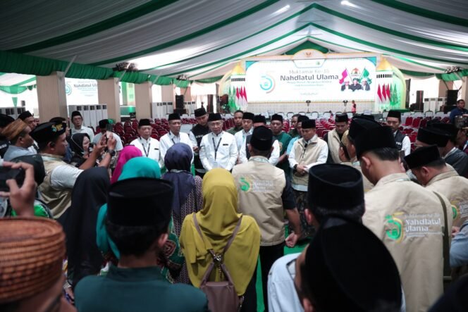 
					Foto:Muktamar ke-35 Nahdlatul Ulama (NU) resmi dibuka Kamis (27/8/2026) pukul 15.00 WIB. Pembukaan digelar di Lapangan Untung Suropati, kawasan Pondok Pesantren Bahrul Ulum Tambakberas, Jombang, Jawa Timur.